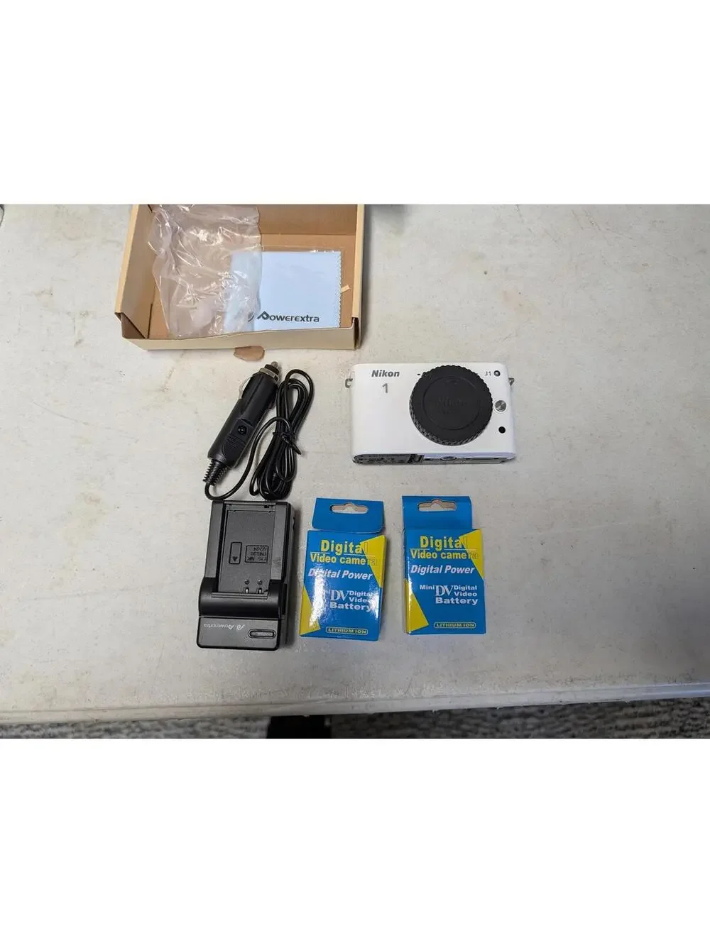 Nikon 1 J1 Mirrorless Digital Camera with Charger and Extra Batteries
